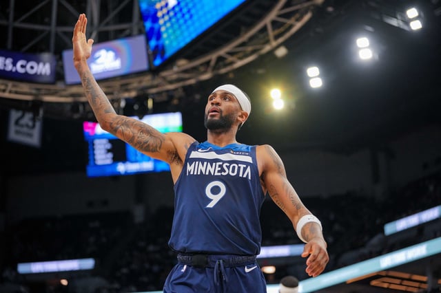 Mar 4, 2025; Minneapolis, Minnesota, USA; Minnesota Timberwolves guard Nickeil Alexander-Walker (9) signals the crowd against the Philadelphia 76ers in the fourth quarter at Target Center. Mandatory Credit: Brad Rempel-Imagn Images/File Photo