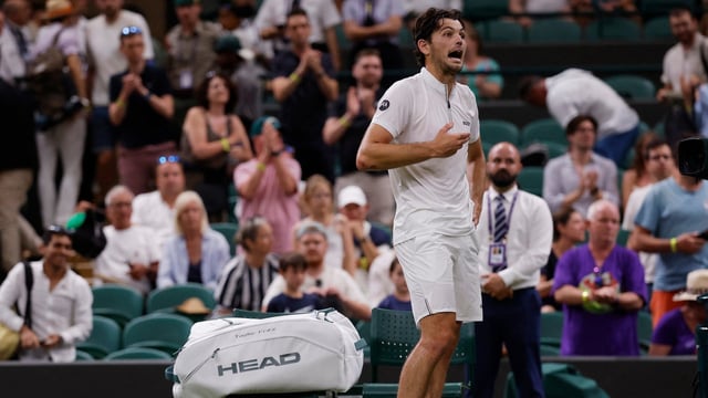Taylor Fritz of the U.S. reacts after his first round match against France's Giovanni Mpetshi Perricard gets suspended