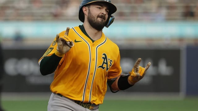 Jun 30, 2025; Tampa, Florida, USA;  Athletics catcher Shea Langeliers (23) hits a three-run home run against the Tampa Bay Rays during the first inning at George M. Steinbrenner Field. Mandatory Credit: Kim Klement Neitzel-Imagn Images
