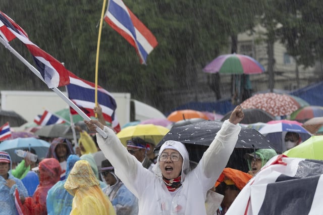 Protesters gather at Victory Monument demanding Thailand's Prime Minister Paetongtarn Shinawatra resign in Bangkok, Thailand, Saturday, June 28, 2025. (AP Photo/Wason Wanichakorn)