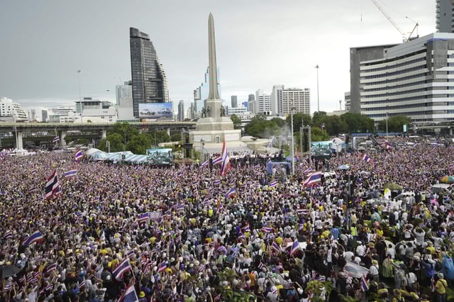 Protesters gather at Victory Monument demanding Thailand's Prime Minister Paetongtarn Shinawatra resign in Bangkok, Thailand, Saturday, June 28, 2025. (AP Photo/Sakchai Lalit)