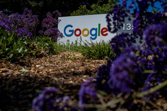 A Google logo is seen at a company research facility in Mountain View, California, U.S., May 13, 2025. REUTERS/Carlos Barria/File Photo