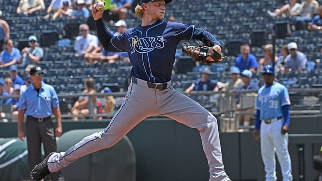 Jun 26, 2025; Kansas City, Missouri, USA;  Tampa Bay Rays starting pitcher Shane Baz (11) throws a pitch in the first inning against the Kansas City Royals at Kauffman Stadium. Mandatory Credit: Peter Aiken-Imagn Images