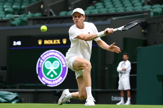 Jannik Sinner of Italy plays a backhand during practice prior to The Championships Wimbledon 2025 at All England Lawn Tennis and Croquet Club on June 26, 2025 in London, England.