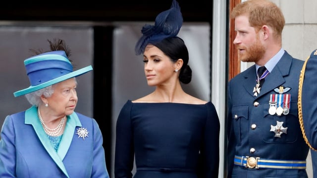 Queen Elizabeth, Meghan and Harry on the balcony of Buckingham Palace in 2018, shortly after the couple married