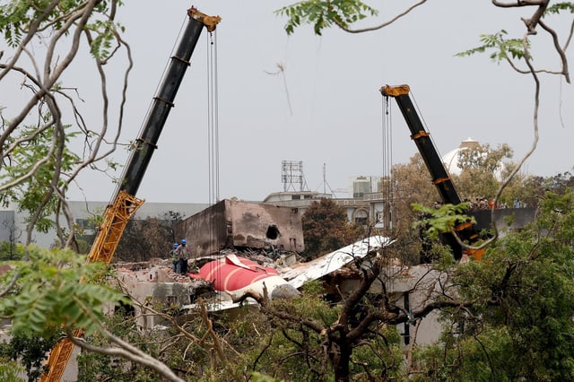 Members of Indian Army's engineering arm prepare to remove the wreckage of an Air India aircraft, bound for London's Gatwick Airport, which crashed during take-off from an airport in Ahmedabad, India June 14, 2025. REUTERS/Amit Dave/File Photo