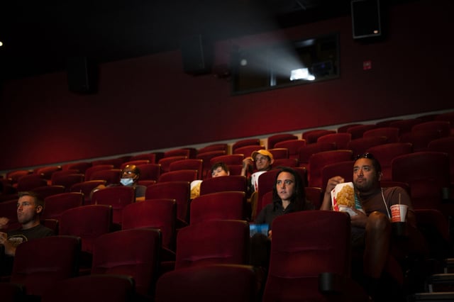 People watch movies in a newly reopened AMC River East theater on Aug, 20, 2020, in Chicago. (E. Jason Wambsgans/Chicago Tribune/Tribune News Service via Getty Images)