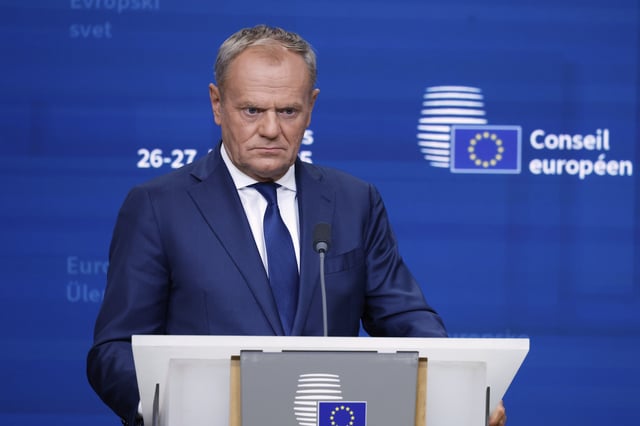 Poland's Prime Minister Donald Tusk addresses a media conference at an EU summit in Brussels, Thursday, June 26, 2025. (AP Photo/Omar Havana)