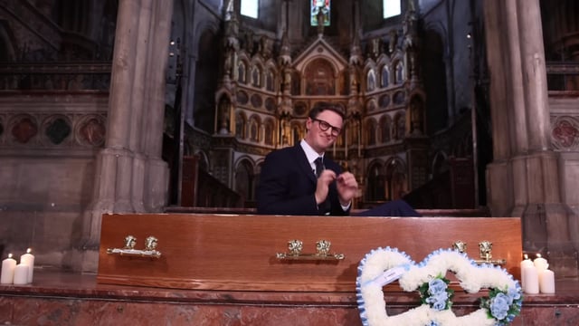 Max Fosh sat upwards in coffin at a funeral