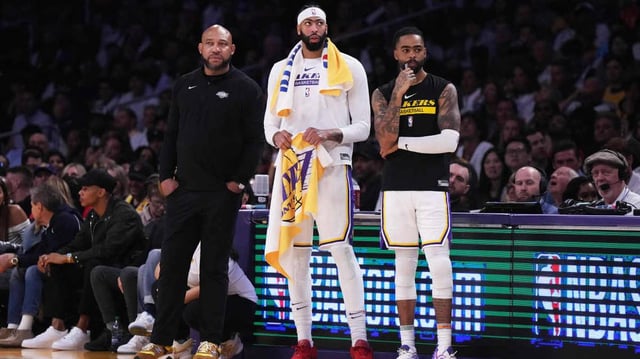 Apr 22, 2023; Los Angeles, California, USA; Los Angeles Lakers coach Darvin Ham (left), forward Anthony Davis (3) and guard D’Angelo Russell (1) react against the Memphis Grizzlies in the fourth quarter during game three of the 2023 NBA playoffs at Crypto.com Arena. Mandatory Credit: Kirby Lee-USA TODAY Sports