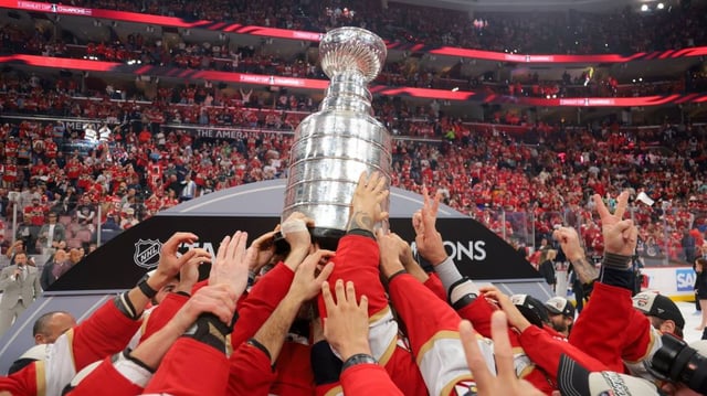 The Florida Panthers hoist the Stanley Cup after winning game six of the 2025 Stanley Cup Final against the Edmonton Oilers at Amerant Bank Arena.