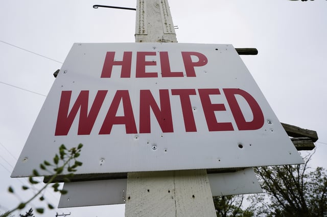 FILE - A help wanted sign is posted in Lansdale, Pa., Friday, April 28, 2023. (AP Photo/Matt Rourke, File)