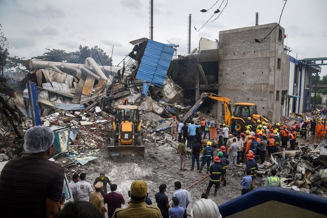 Rescue workers look for survivors after an explosion and fire at a chemical factory, in Sangareddy, in the southern state of Telangana, India, June 30, 2025. REUTERS/Stringer     TPX IMAGES OF THE DAY     