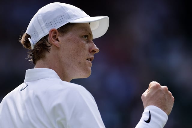 Tennis - Wimbledon - All England Lawn Tennis and Croquet Club, London, Britain - July 1, 2025 Italy's Jannik Sinner reacts during his first round match against Italy's Luca Nardi REUTERS/Stephanie Lecocq