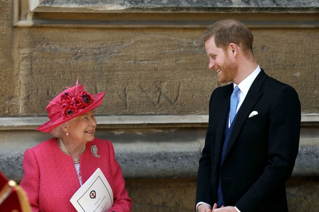 Queen Elizabeth II speaks with Prince Harry at the wedding of Lady Gabriella Windsor to Thomas Kingston at St George&#39;s Chapel, Windsor Castle on May 18, 2019.