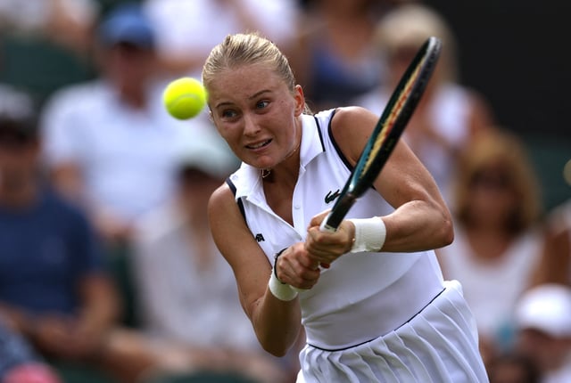 Tennis - Wimbledon - All England Lawn Tennis and Croquet Club, London, Britain - July 1, 2025 Russia's Polina Kudermetova in action during her first round match against Poland's Iga Swiatek REUTERS/Andrew Couldridge
