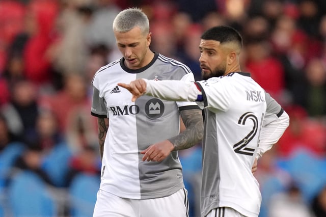 Toronto FC's  Lorenzo Insigne (right) and Federico Bernardeschi confer over a free kick during action MLS action against New York Red Bulls in Toronto on  Wednesday May 17, 2023.