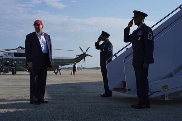 President Donald Trump boards Air Force One for a trip to visit a new migrant detention center in Ochopee, Fla., Tuesday, July 1, 2025, in Andrews Air Force Base, Md. (AP Photo/Evan Vucci)