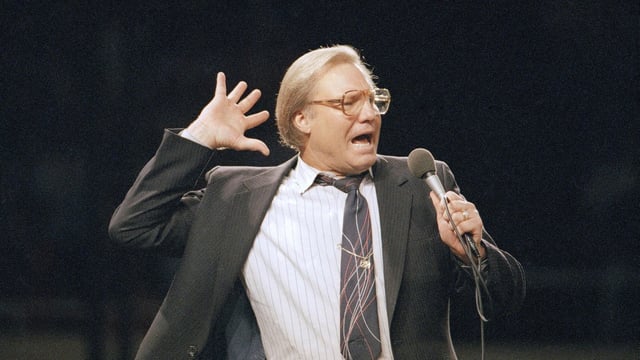 FILE - The Rev. Jimmy Swaggart gestures as he preaches the Gospel to the nearly 14,000 faithful who attended his Los Angeles Crusade in the Sports Arena, Sunday, March 29, 1987. (AP Photo/Mark Avery, file)