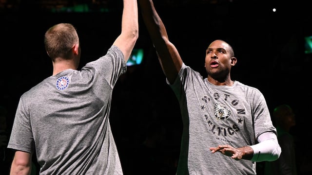 Dec 4, 2024; Boston, Massachusetts, USA; Boston Celtics center Al Horford (42) high-fives forward Sam Hauser (30) before a game against the Detroit Pistons at the TD Garden. Mandatory Credit: Brian Fluharty-Imagn Images