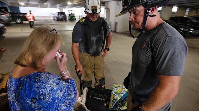 Fort Worth firefighters helped collect personal items on Monday, June 30, for residents displaced by the June 23 fire at The Cooper apartments on West Rosedale Street.