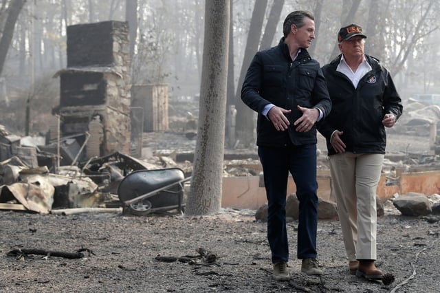 President Donald Trump talks with Gavin Newsom, then California&#39;s governor-elect, during a November 2018 visit to Paradise, the Butte County town destroyed by the Camp Fire. 