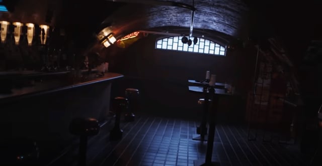 A dimly lit bar in the teaser for Apple TV Plus’ Neuromancer