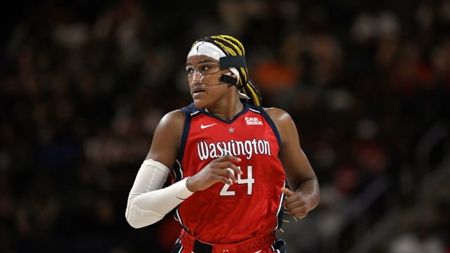 Washington Mystics forward Aaliyah Edwards (24) runs up court during the second half of a WNBA basketball game against the New York Liberty, Tuesday, May 14, 2024, in Washington. (AP Photo/Terrance Williams)
