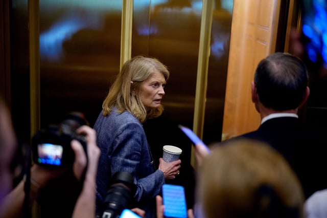 Murkowski takes an elevator just off the Senate floor on July 1 in Washington, DC.