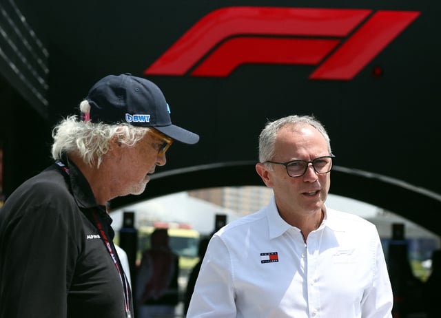 Formula One F1 - Saudi Arabian Grand Prix - Jeddah Corniche Circuit, Jeddah, Saudi Arabia - April 20, 2025 Alpine executive advisor Flavio Briatore and Formula One Group CEO Stefano Domenicali arrive before the race REUTERS/Jakub Porzycki/File Photo