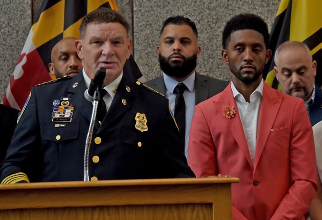 During a news conference at City Police headquarters this morning, Police Commissioner Richard Worley, left, and Mayor Brandon Scott, right, announced the takedown of a drug trafficking organization that was operating in East Baltimore.
