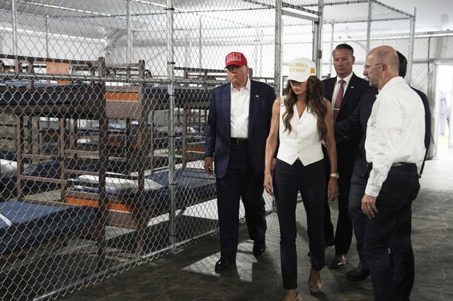 President Donald Trump, Gov. Ron DeSantis, R-Fla., and Homeland Security Secretary Kristi Noem, and others, tour “Alligator Alcatraz,” a new migrant detention facility at Dade-Collier Training and Transition facility, Tuesday, July 1, 2025, in Ochopee, Fla. Trump renewed his push to reopen Alcatraz in San Francisco, saying “conceptual work” began months ago — and proposes surrounding the prison with sharks.