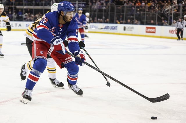 Jan 2, 2025; New York, New York, USA;  New York Rangers defenseman K'Andre Miller (79) chases the puck in the third period against the Boston Bruins at Madison Square Garden. Mandatory Credit: Wendell Cruz-Imagn Images/File Photo