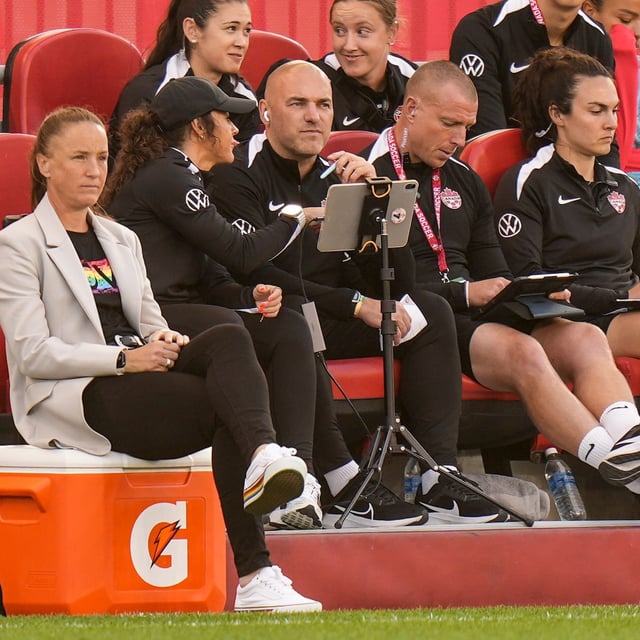 Canada's Head Coach Casey Stoney sits on a cooler as she watches her team against Costa Rica during international women's friendly soccer action in Toronto, on Friday June 27, 2025. THE CANADIAN PRESS/Chris Young