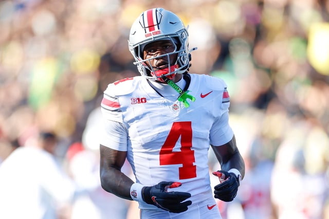 Jeremiah Smith #4 of the Ohio State Buckeyes warms up prior to a game against the Oregon Ducks at Autzen Stadium on October 12, 2024 in Eugene, Oregon.