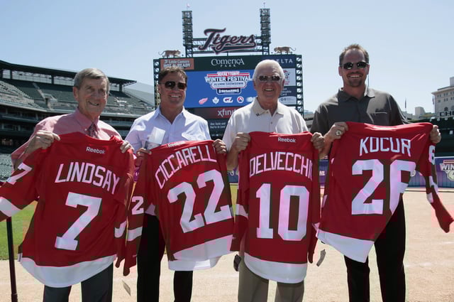 Members of Detroit Red Wings alumni Ted Lindsay (L), Dino Ciccarelli, Alex Delvecchio and Joe Kocur hold Red Wings jerseys during a news conference to announce the preliminary rosters for the 2012 Toronto Maple Leafs vs. Red Wings Alumni Showdown hockey game on December 31st at Comerica Park in Detroit, Michigan July 11, 2012. REUTERS/Rebecca Cook/File Photo