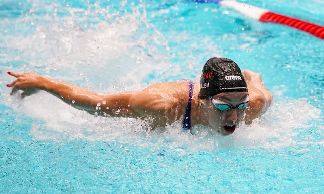 Jun 5, 2025; Indianapolis, Indiana, UNITED STATES; Gretchen Walsh swims in the womenÕs 100 meter butterfly at the Toyota National Championships swimming meet at Indiana University Natatorium. Mandatory Credit: Robert Goddin-Imagn Images/File Photo