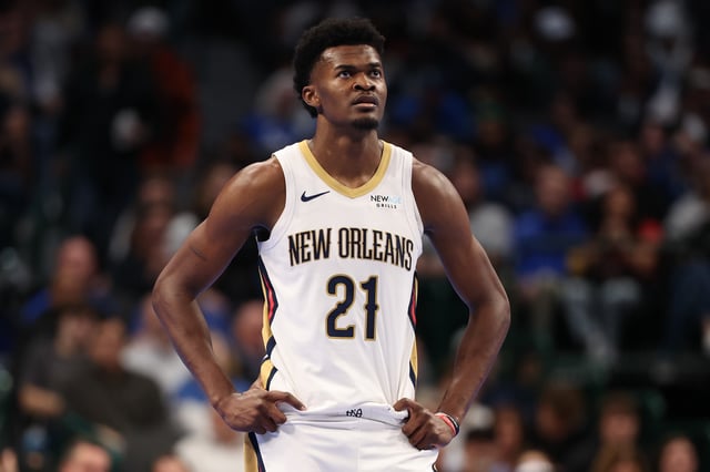Yves Missi #21 of the New Orleans Pelicans looks on during the second half of an Emirates NBA Cup game against the Dallas Mavericks at American Airlines Center on November 19, 2024 in Dallas, Texas.