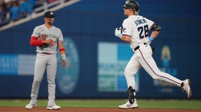 Jul 1, 2025; Miami, Florida, USA;  Miami Marlins left fielder Kyle Stowers (28) rounds the bases after hitting a home run in the second inning against the Minnesota Twins at loanDepot Park. Mandatory Credit: Jim Rassol-Imagn Images