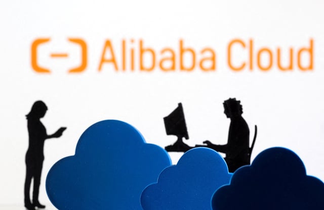 3D printed clouds and figurines are seen in front of the Alibaba Cloud service logo in this illustration taken February 8, 2022. REUTERS/Dado Ruvic/Illustration