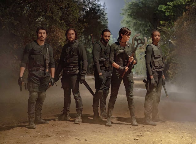 Henry Golding, from left, Luca Marinelli, Marwan Kenzari, Charlize Theron and KiKi Layne are immortal warriors in “The Old Guard 2.”