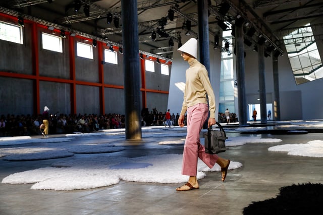 A model presents a creation from Prada Spring-Summer 2026 menswear collection during the Milan Fashion Week in Milan, Italy, June 22, 2025. REUTERS/Alessandro Garofalo/File Photo