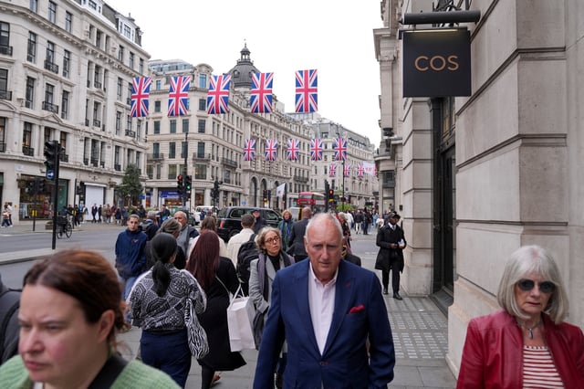 Shoppers walk on Regent Street in London, Britain, May 15, 2025. REUTERS/Maja Smiejkowska/File Photo