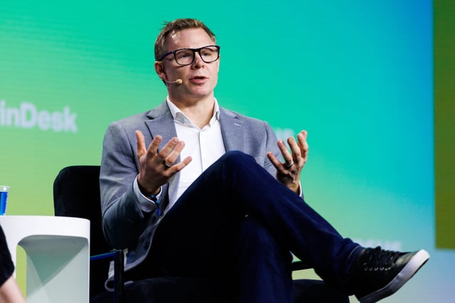 Lucas Matheson, Coinbase Canada's CEO, speaks at Consensus 2025 by Coindesk, in Toronto, Thursday, May 15, 2025. (Cole Burston)