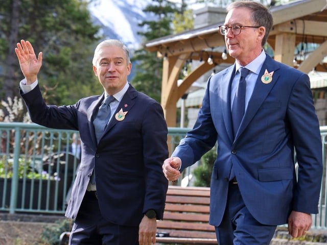 Canada's Finance Minister Francois-Philippe Champagne, left, and Bank of Canada Governor Tiff Macklem arrive to greet fellow G7 finance ministers and central bank governors at the Rimrock Resort Hotel in Banff on Wednesday May 21, 2025. 