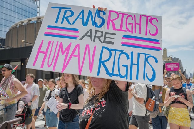 A participant holds a “Trans rights are human rights” sign during the Reclaim Pride Coalition’s Queer Liberation March in Manhattan.