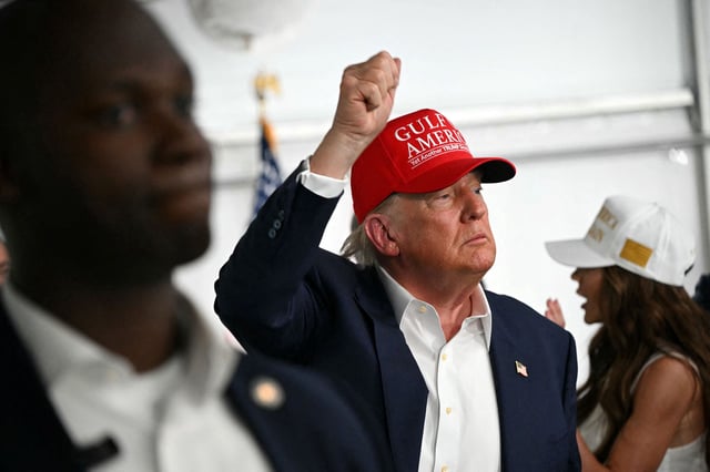 President President Donald Trump waves as he visits a migrant detention center, dubbed "Alligator Alcatraz," located at the site of the Dade-Collier Training and Transition Airport in Ochopee, Florida, on July 1.