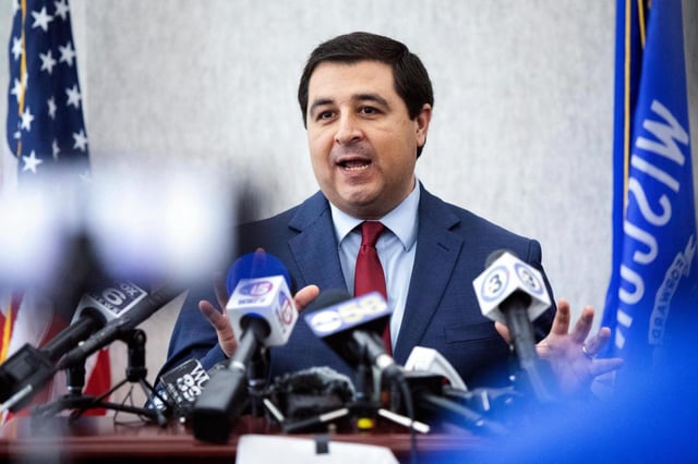 FILE – Wisconsin Attorney General Josh Kaul delivers remarks following hearing before Dane County Wis. judge Diane Schlipper which challenges a 174-year-old feticide law in Madison, Wis., May 4, 2023. (John Hart/Wisconsin State Journal via AP, File)