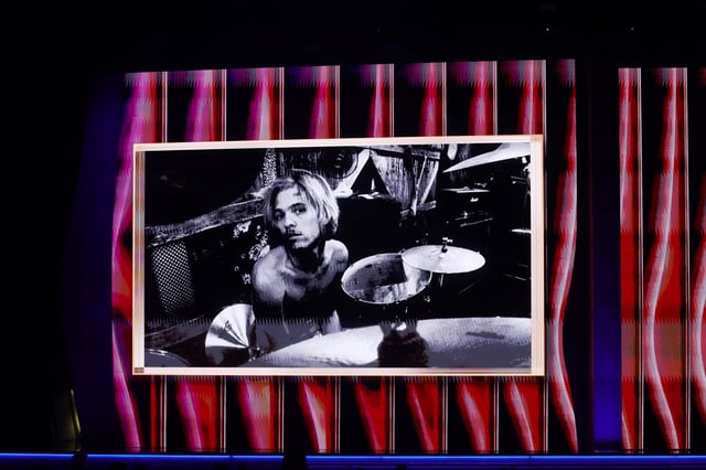 An image of the late Taylor Hawkins is projected onto a screen during the 64th Annual GRAMMY Awards at MGM Grand Garden Arena on April 3, 2022, in Las Vegas.