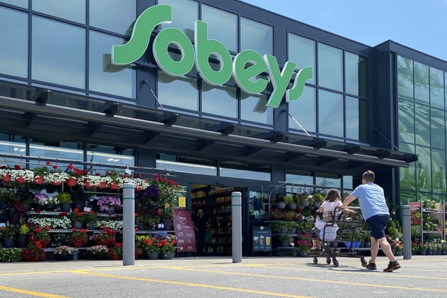 Sobeys parent company Empire Co. Ltd. has officially signed on as the first retailer member of Canada's grocery code of conduct, as work continues to develop governance rules for its members ahead of a full implementation by Jan. 1. Shoppers at a west-end Toronto Sobeys grocery store, Sunday, June 26, 2023. THE CANADIAN PRESS/Graeme Roy